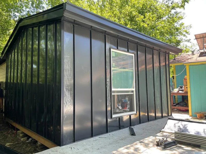 Black standing seam metal wall panels for Metal Roof Installation in Archdale