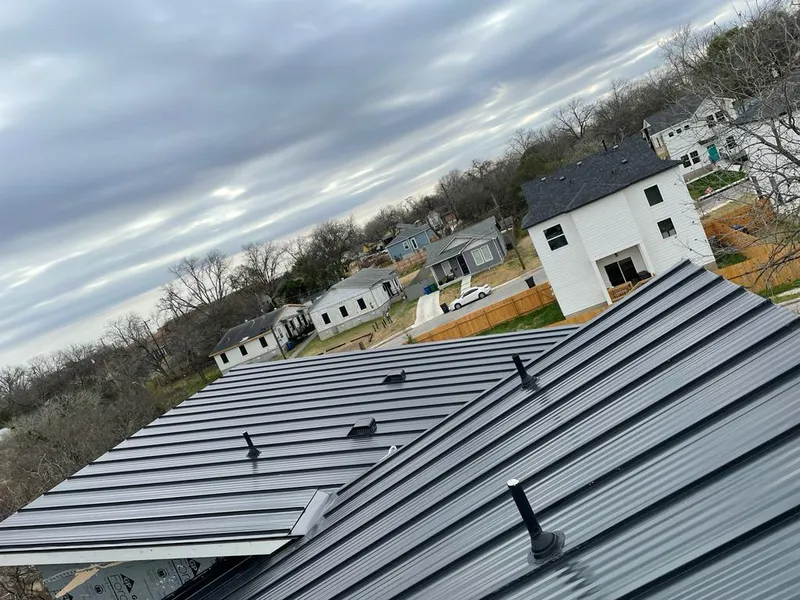 Standing seam metal roof panels with vents for Skylight Repair in Archdale